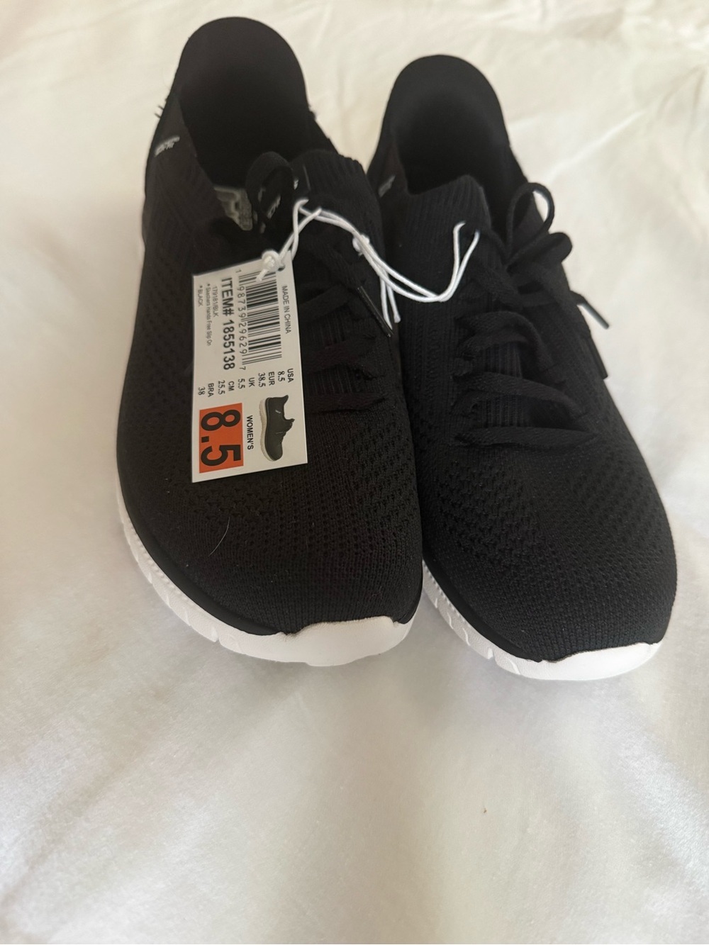 Skechers Black Slip-On Knit Athletic Sneakers with White Soles